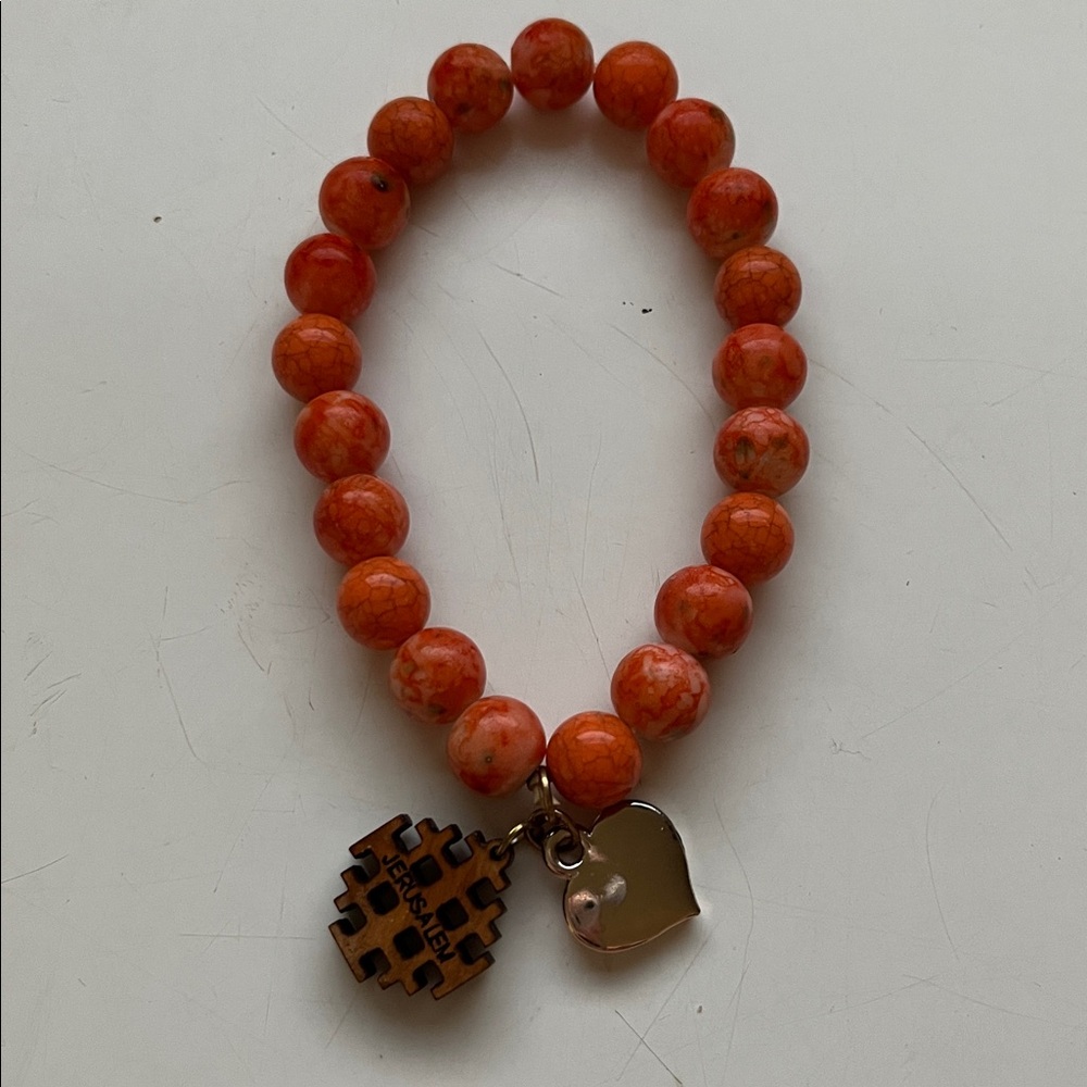 Religious Orange Beaded Bracelet with Charms